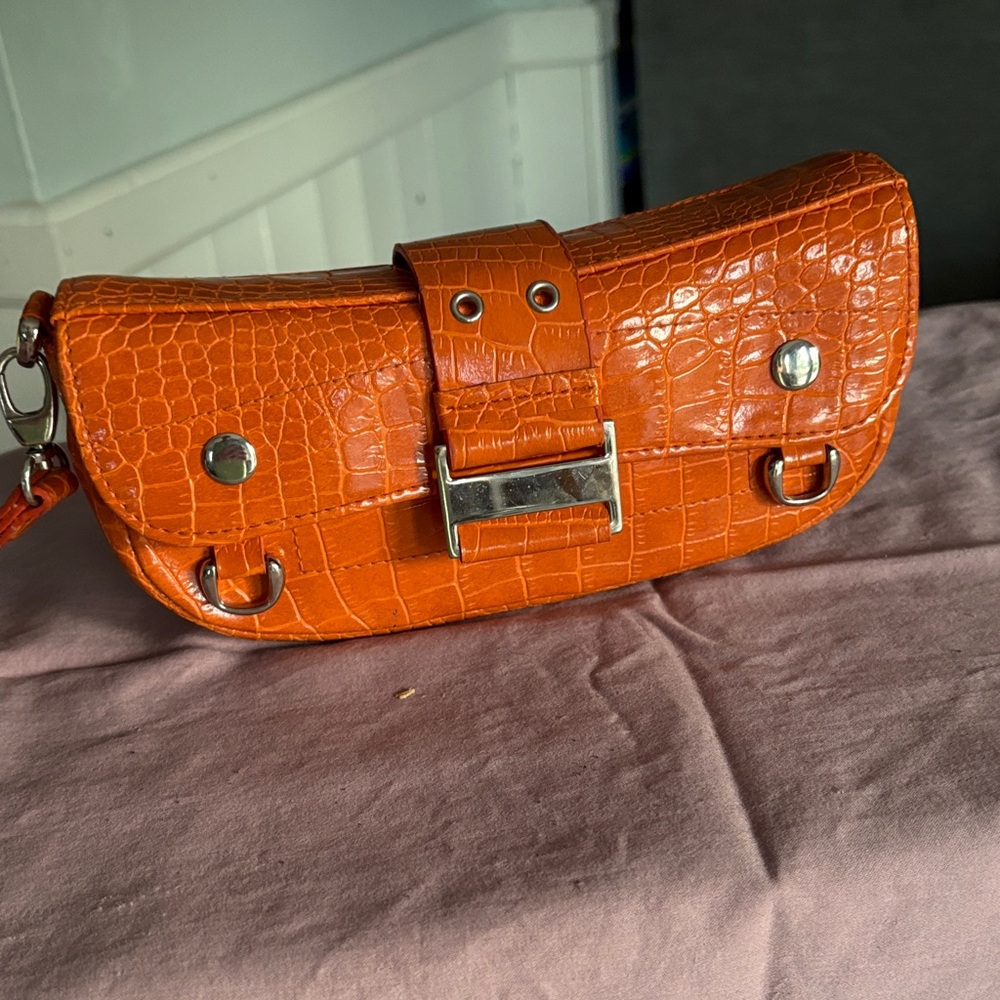 Jennifer Lopez Orange Crocodile-Embossed Clutch